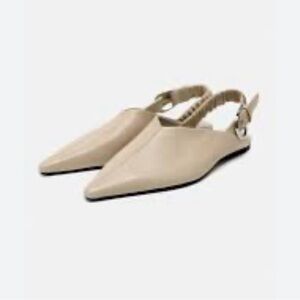Like new Zara pointed toe slingback flats in tan. Size 40 or 9. EUC.